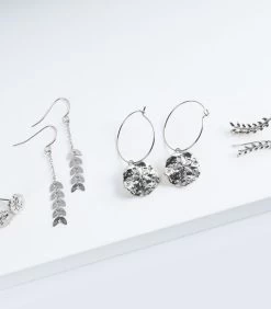 Geurkaars Kokosnoot Met Zilveren Oorbellen -Decoratie Verkoop 26a7ce70540641e3beb51df666004979