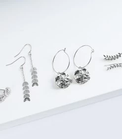 Geurkaars Citrus Met Zilveren Oorbellen -Decoratie Verkoop 3d356d6f181240c885861e7a7fd896ba